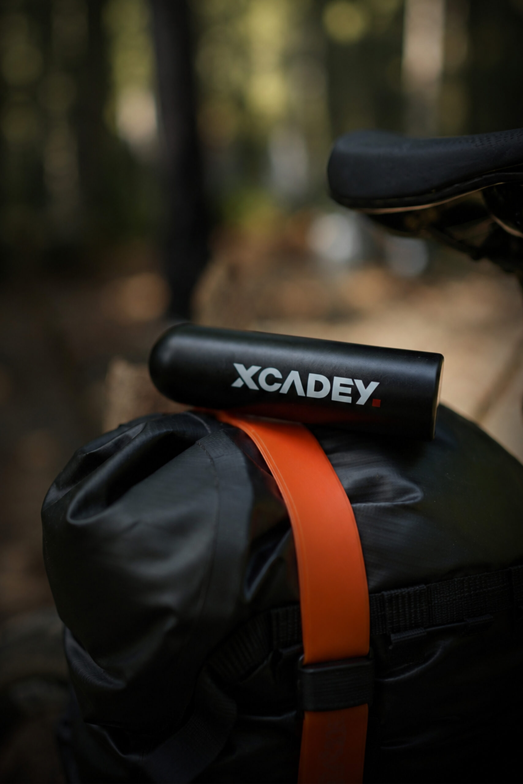 Bikepacking bicycle carrying a compact mini electric pump for travel