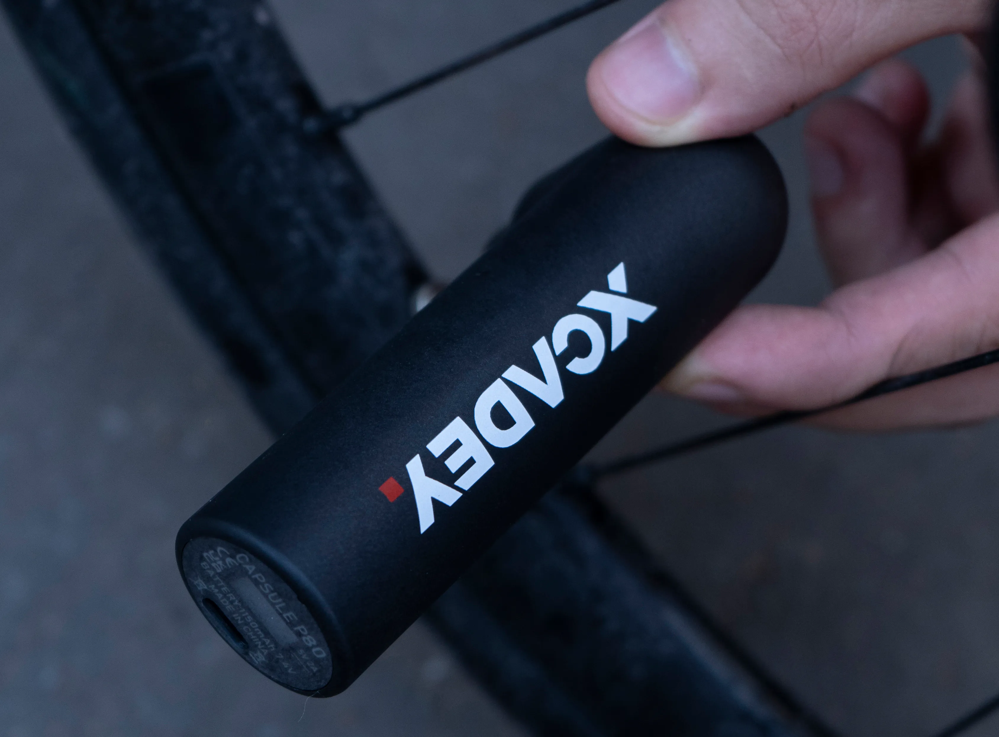 XCADEY CAPSULE P80 electric bike pump in riding use